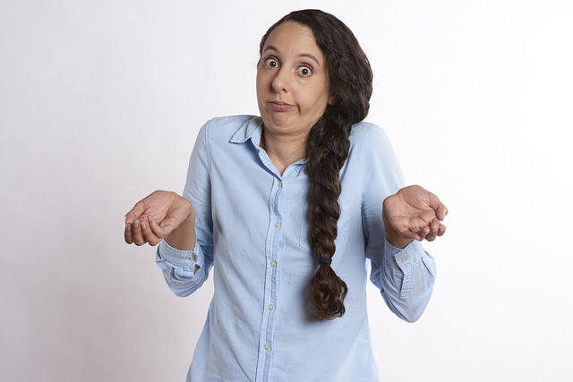 Person shrugging at a speech bubble containing the phrase 'goody two-shoes'
